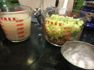 Rice soaking and vegetables diced
